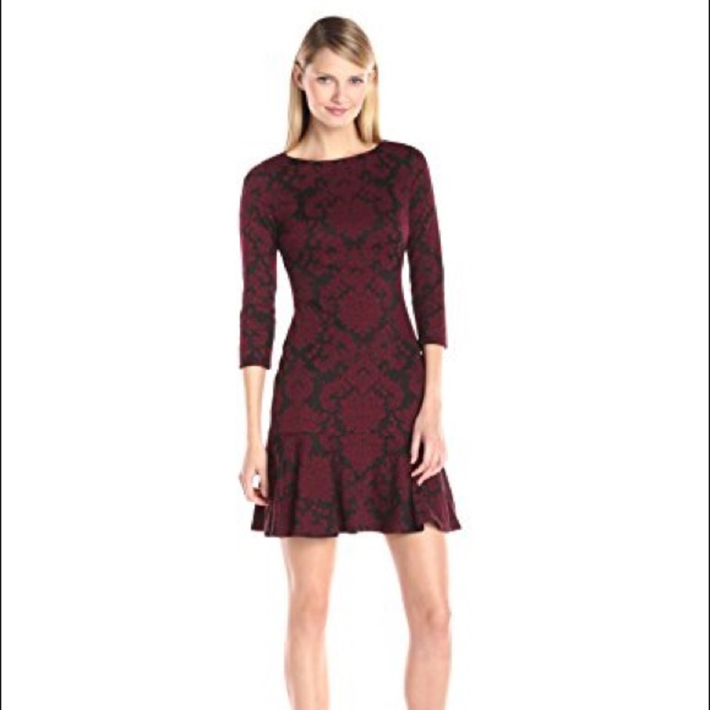 Burgundy embroidered Ivanka Trump dress.